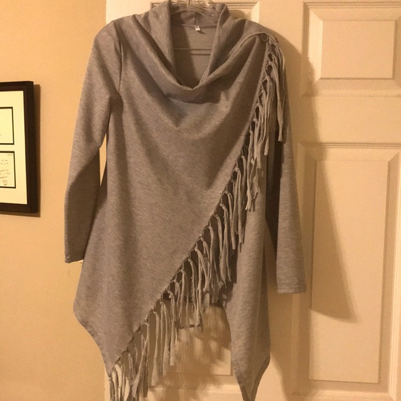 Long sleeve fringe asymmetrical shirt/sweater. - Picture 1 of 2